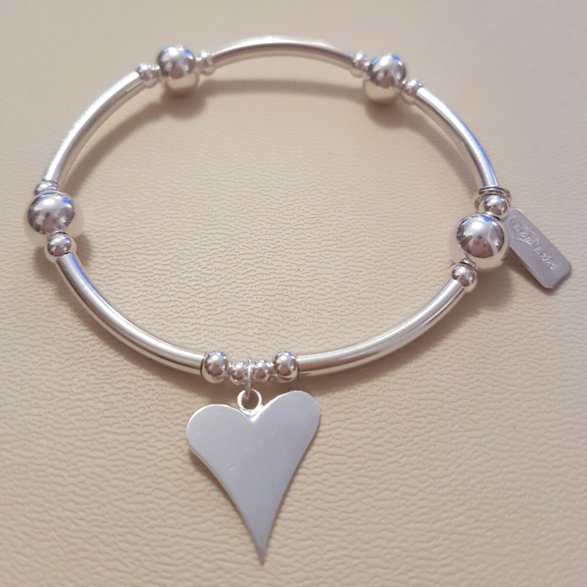 Chunky silver best sale heart bracelet